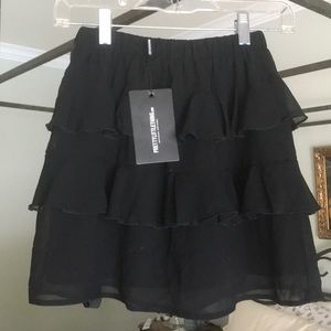 Pretty Little Thing. Black ruffled mini skirt